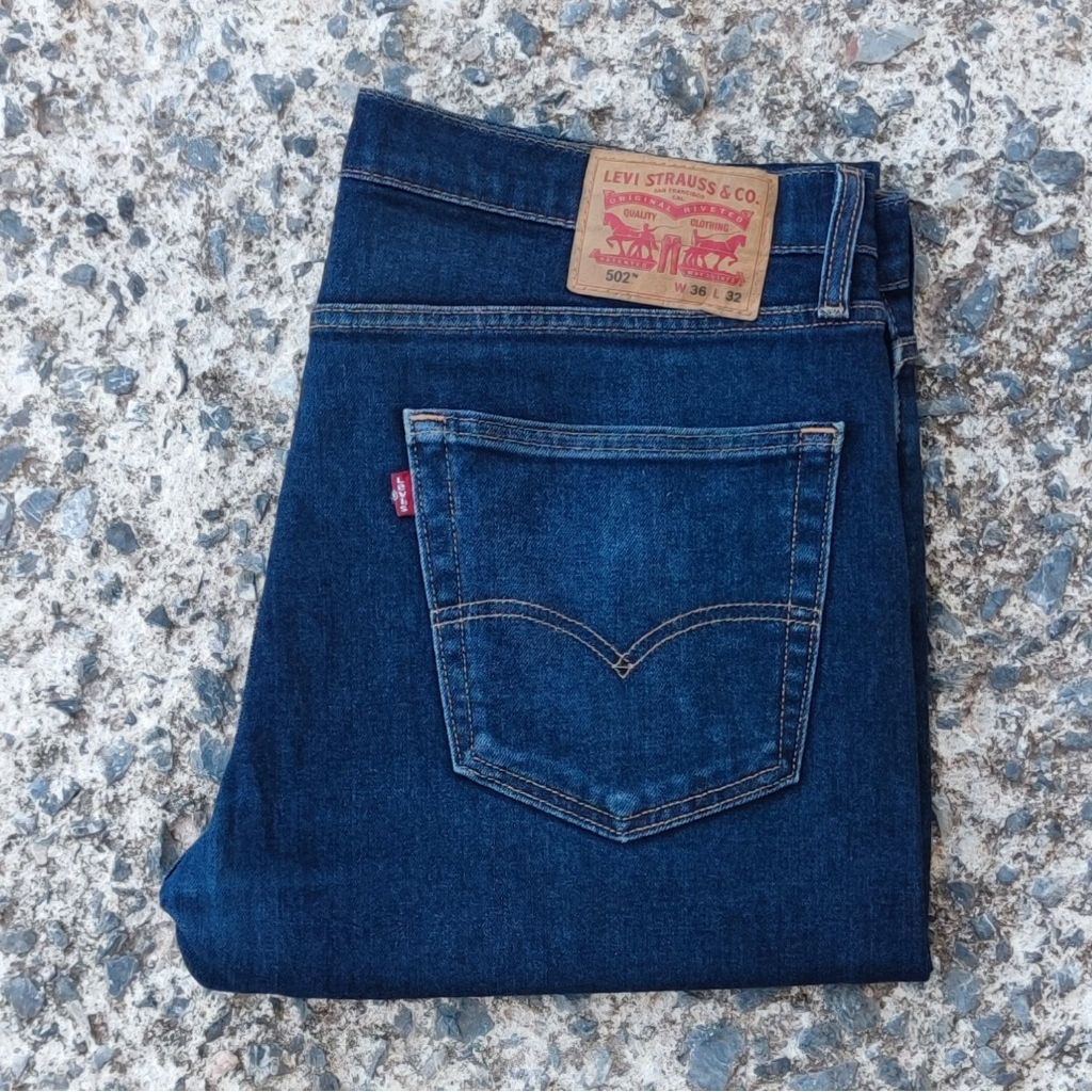 J23/38 กางเกงยีนส์มือสอง 502 เอววัดจริง 38" ยาวทั้งตัว 41" ปลายขา 7.5" ผลิต China ผ้ายืด 1%