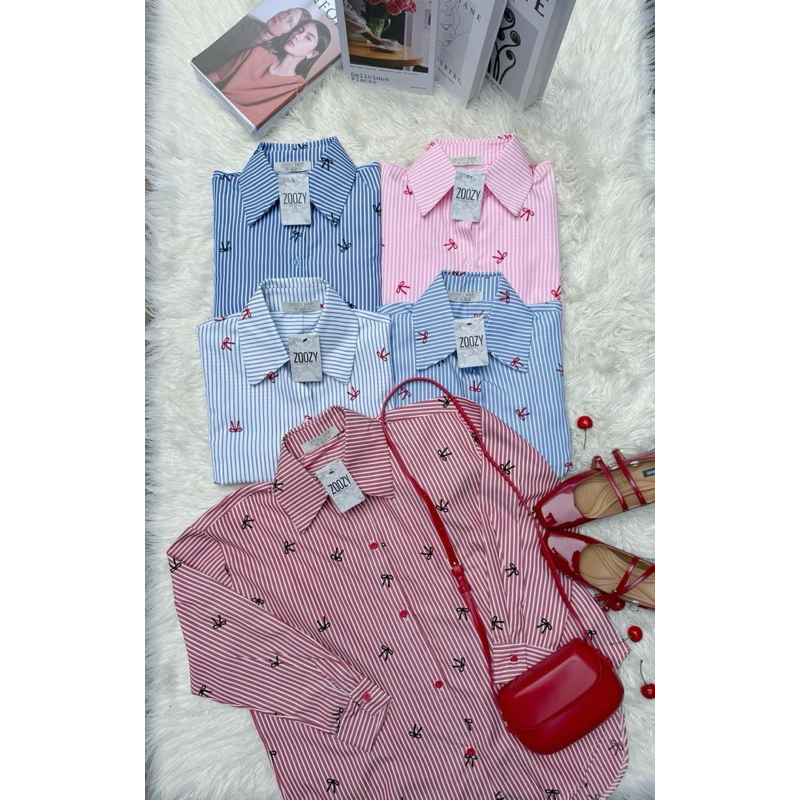 เสื้อเชิตแขนยาว พิมพ์ลายโบว์รอบตัว (ผ้า Polyester) กระดุมหน้า