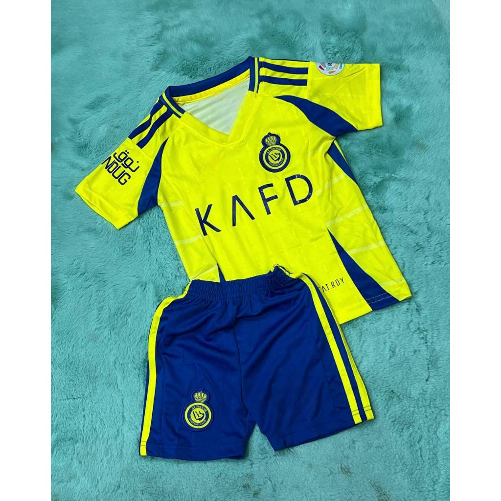 ชุดบอลเด็ก ทีมAl-Nassr Kids ปี2025 ชุดกีฬาเด็กทีม ซื้อครั้งเดียว ได้ทั้งชุด เสื้อพร้อมกางเกง ราคาถูก ใหม่ล่าสุด