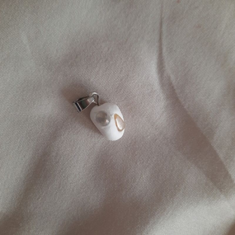 Stone earth pendant from frank garcon