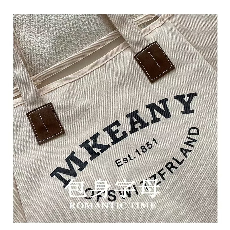 กระเป๋าสะพายไหล่ กระเป๋าMKEANY กระเป๋าผ้าแคนวาส พร้อมส่งกระเป๋าแถมตุ๊กตา - รูปที่ 6