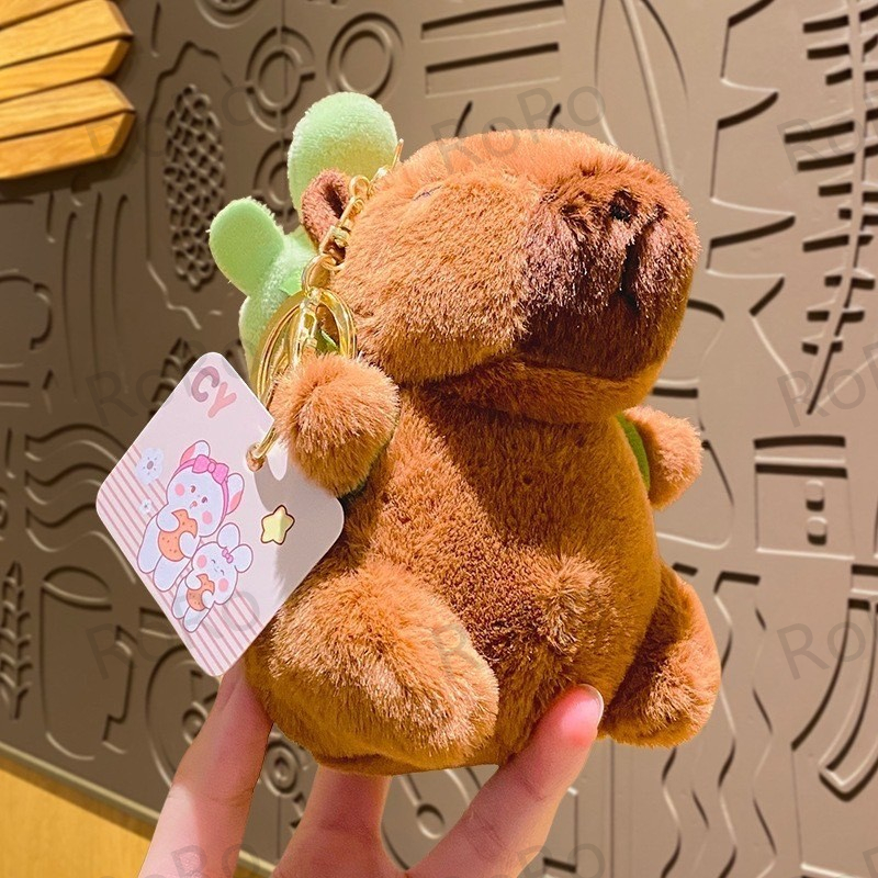 พวงกุญแจ คาปิบารา พวงกุญแจ capybara พวงกุญแจตุ๊กตาคาปิบารา ตุ๊กตาผ้ากํามะหยี่ขนนิ่ม น่ารัก ของเล่นสําหรับเด็กผู้หญิง