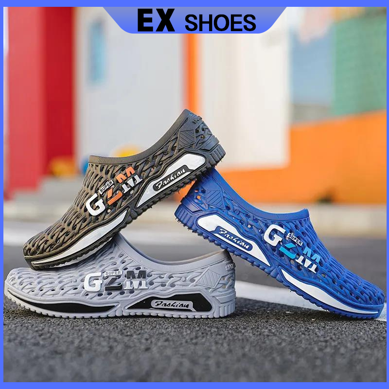 ผู้ชายกีฬารองเท้าแตะฤดูร้อนรองเท้าหลุมสบาย ๆ กันลื่นด้านล่างหนาแฟชั่นกลางแจ้งรองเท้าแตะสําหรับผู้ชายขาย