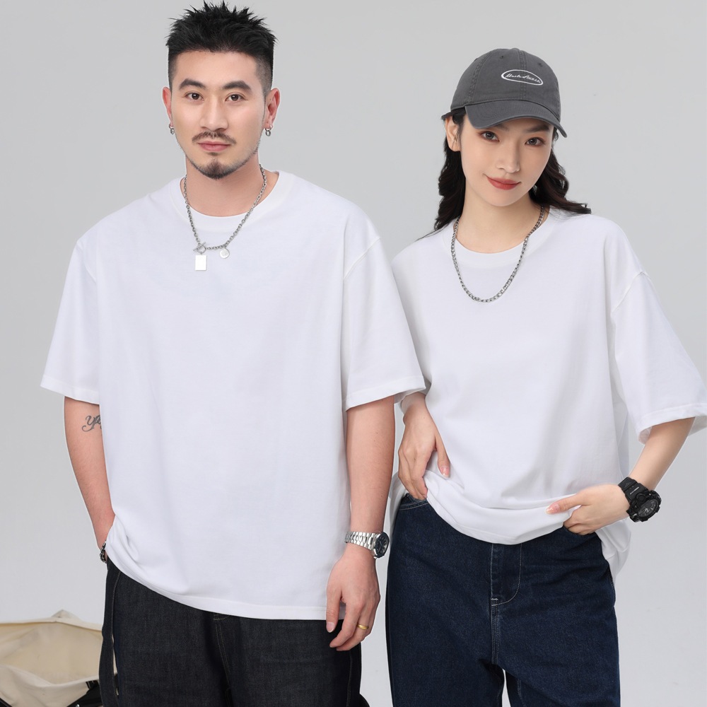 เสื้อยืดคอกลม ผ้าหนายับยากรีดง่าย สีทึบ แขนสั้น เสื้อยืดทรงหลวม ดีไซน์คลาสสิค เสื้อยืดเปล่า ใหญ่ สี Black White