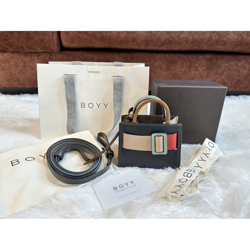 Used boyy bobby charm with strap💯