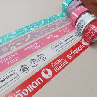 เทป​ขอบคุณ​  พิมพ์​THANKYOU  หน้ากว้าง 2นิ้ว ติดกล่อง​ เนื้อ…