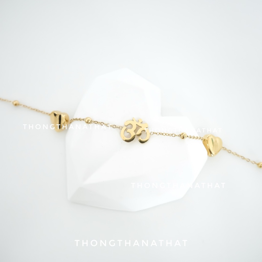 สร้อยข้อมือหัวใจ หน้า พระพิฆเนศ-หลัง พระแม่ลักษมี โอม 18K งานสแตนเลส สายปรับไซส์ได้ เทพความสำเร็จ กำไลโอม Thongthanathat