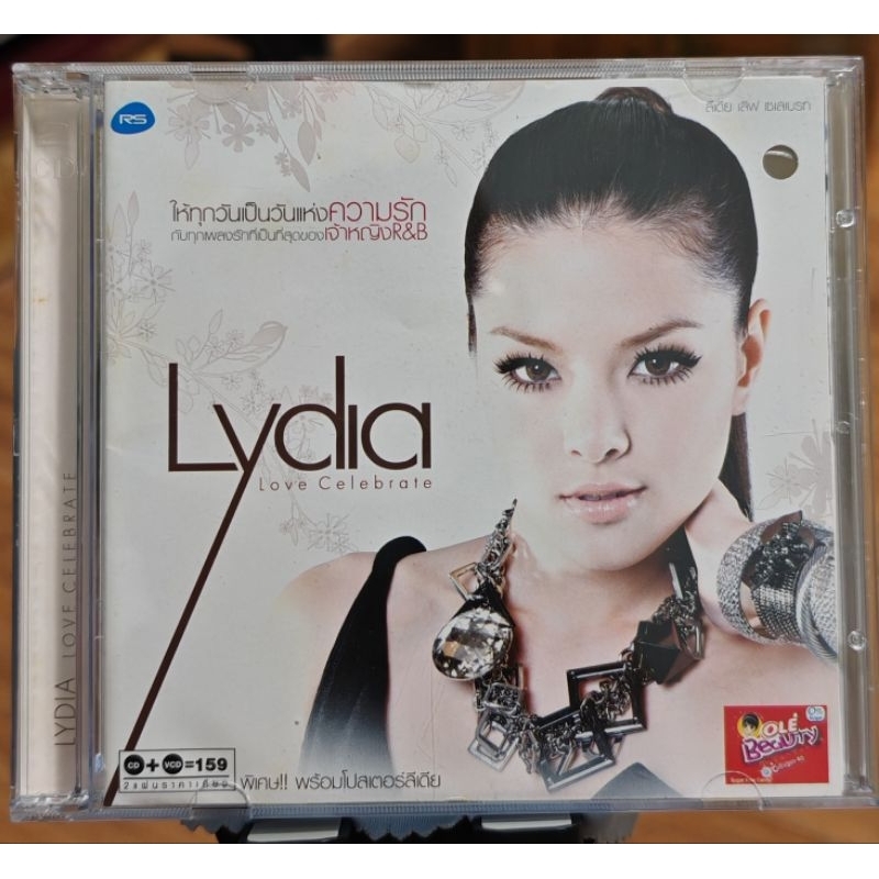 (CD +VCD) : Lydia อัลบั้ม  Love Celebrate (มือ2),เจาะปกหน้า 1รู