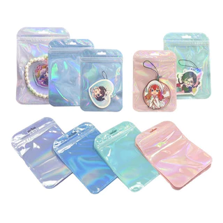 พร้อมส่ง✅ 50ใบ ถุงซิปล็อค ถุงซิปล็อคโฮโลแกรม สกรีนโลโก้ได้ ถุงซิปล็อคสีเลเซอร์ พาสเทล ซอง มีรูแขวน มีหลายขนาด