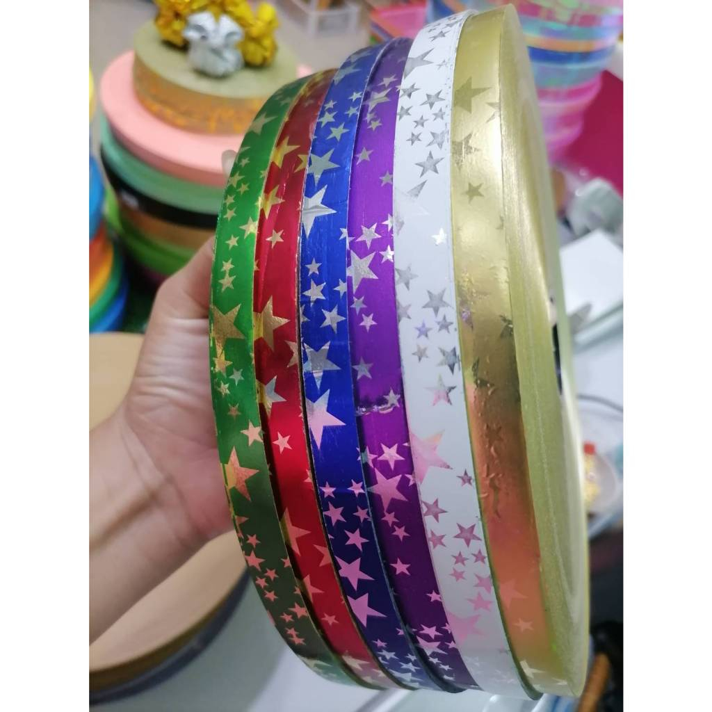 ริบบิ้นเมทาลิคตรามงกุฏ ลายดาวเล็ก ลายดาวใหญ่ ขนาด 12มิล ยาว350หลา เนื้อหนา สีสวย
