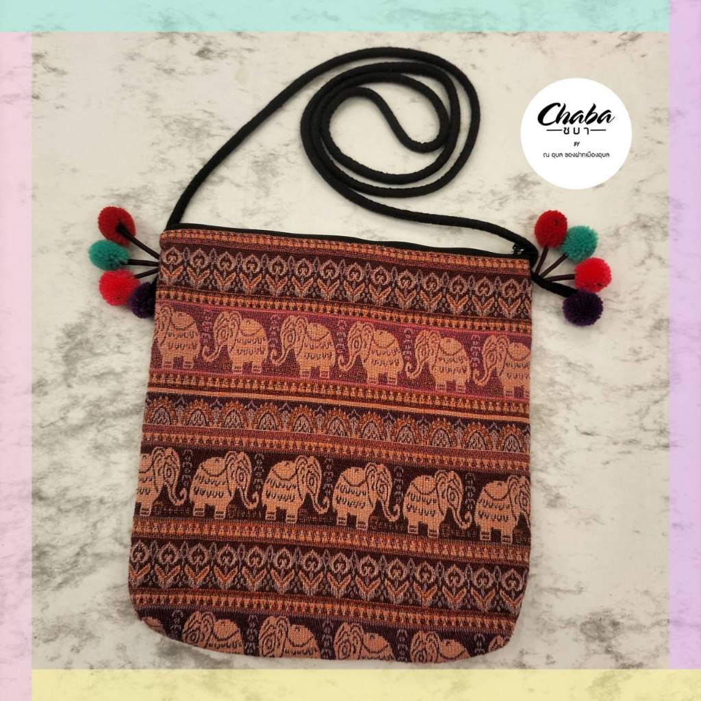 🐘❤️💙กระเป๋าสะพายยาว งานผ้าฝ้ายนากาลายช้าง แต่งปอมพู่/มีซิป/สายเชือกดำ/สายแม้ว   📌📌 จัดส่งตามโทนลายผ้าที่เลือก 📌📌