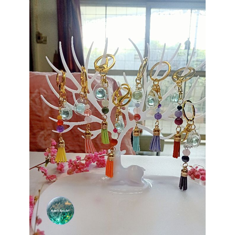 พวงกุญแจหินนำโชคลูกแก้วยันต์นะวัดถ้ำเมืองนะสีตามวันเกิด