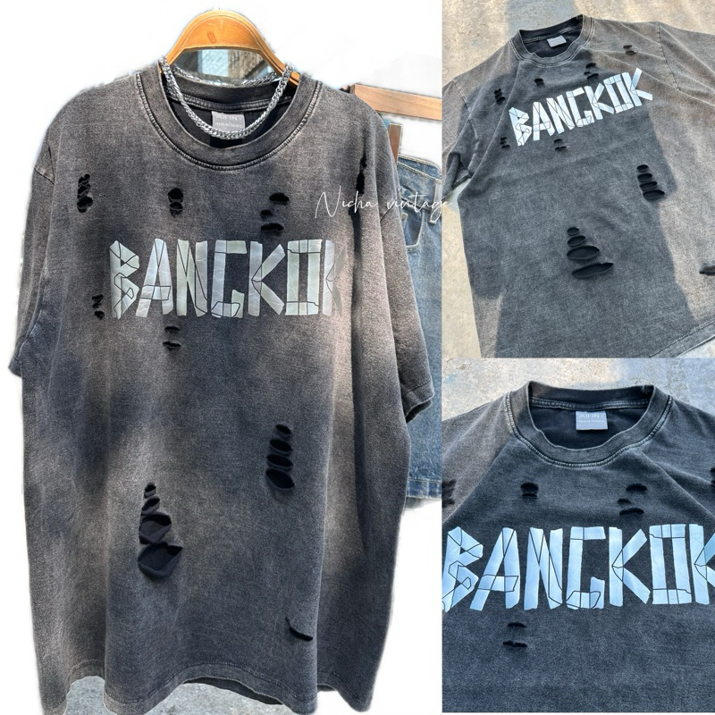 เสื้อยืดผ้าฟอกวินเทจแต่งขาด รีดอักษรเงิน แบงค์คอก โอเวอร์ไซร์อก46.-