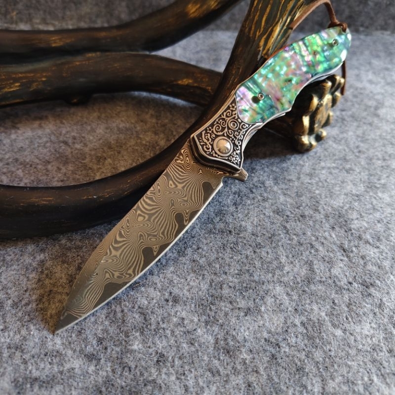 มีดพับอเนกประสงค์เหล็กดามัสกัส 67 ชั้นทบแกนกลาง VG10ด้ามจับเปลือกหอยเป๋าฮื้อ+G10 
 คอเหล็ก