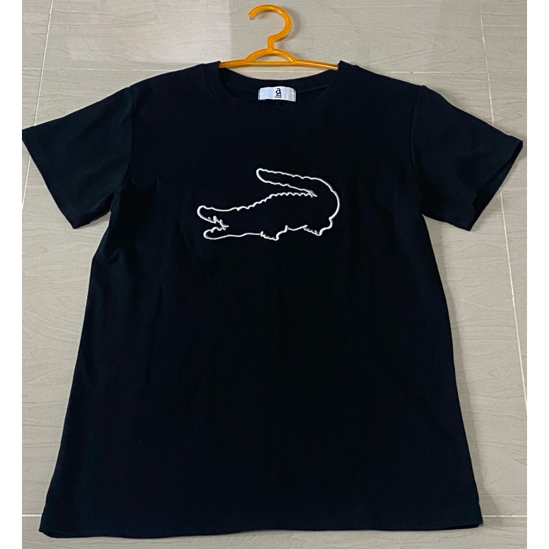 เสื้อยืดสีดำงานป้าย a21 Shop