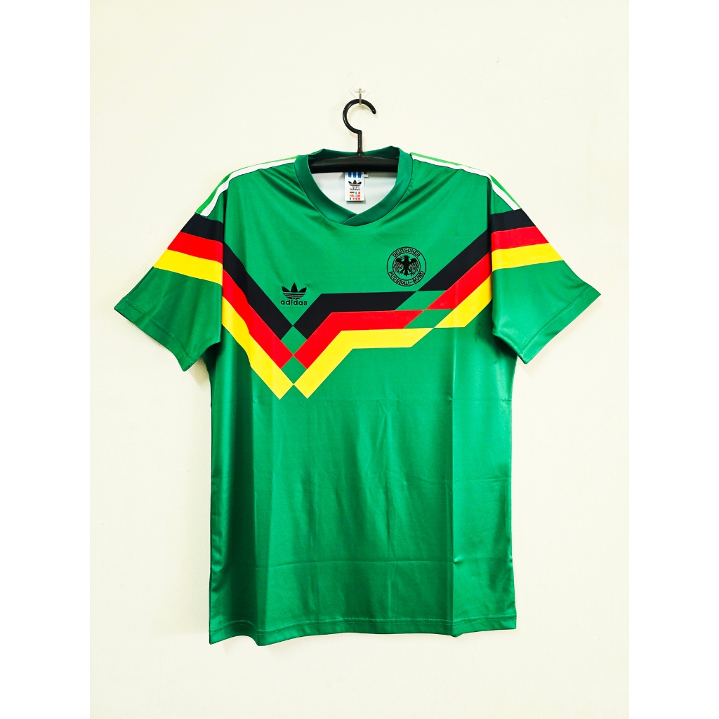 เสื้อทีมชาติเยอรมันนี ปี 1990 ชุดเยือน (งานย้อนยุคเกรดพรีเมี่ยม) (เสื้อเเชมป์โลกสมัยที่ 3)