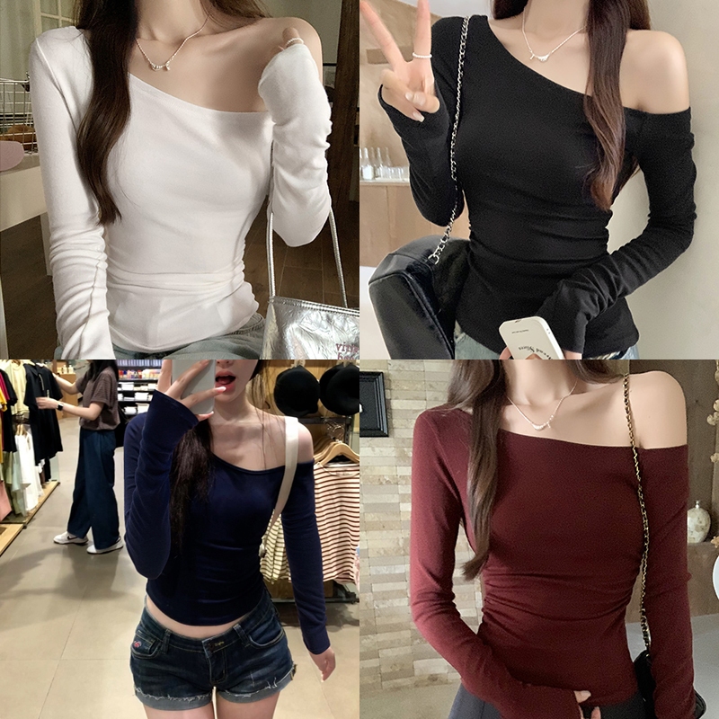 ELLY พร้อมส่ง💓เสื้อยืดแขนยาวผู้หญิง💓crop topสีพื้น ทรงเข้ารูปY2K เสื้อไหล่เดียวเซ็กซี่ เสื้อรัดรูปเปิดไหล่สไตล์เกาหลี
