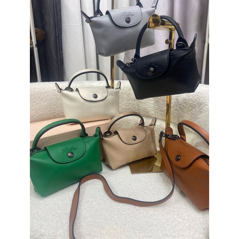 Longchamp กระเป๋าผู้หญิงแบบถือเส้นเดียวหนังวัวกระเป๋าทรงเกี๊ยวขนาดเล็กมีสายคล้องพาดไหล่ปรับได้ [พร้อมส่งในไทย ]