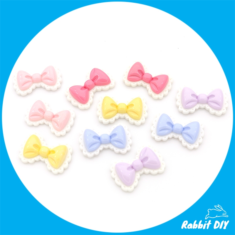 เรซิ่น โบว์ มีหลายสี ระบายขอบสีขาว (แพ็กรวมทุกสี 10 ชิ้น)