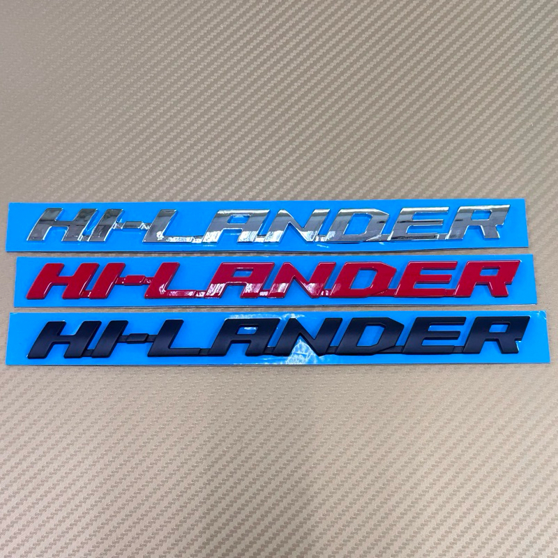 โลโก้ Hilander ติดข้าง ISUZU D-max 2003-2011  ขนาด 2 x 25 ราคาต่อชิ้น