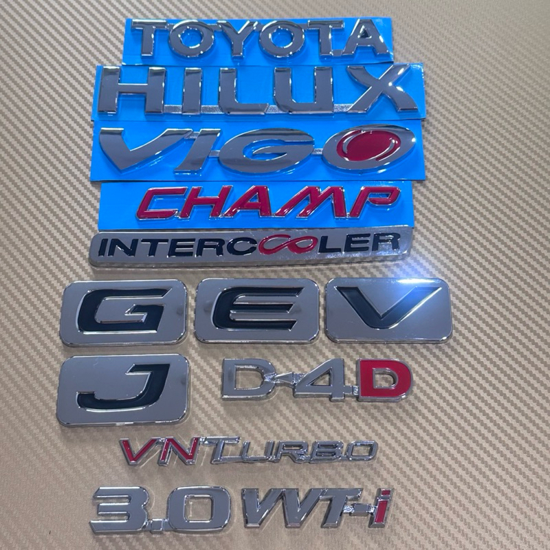 โลโก้ติดรถ Toyota Hilux Vigo สีชุบโครเมี่ยม ราคาต่อชิ้น