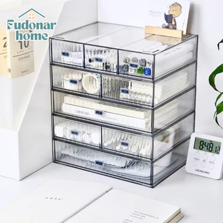 Fudonar ลิ้นชักตั้งโต๊ะทรงเตี้ยแบบใส ผิวหน้าลอน วางซ้อนเองได้ เก็บเครื่องเขียนบนโต๊ะ