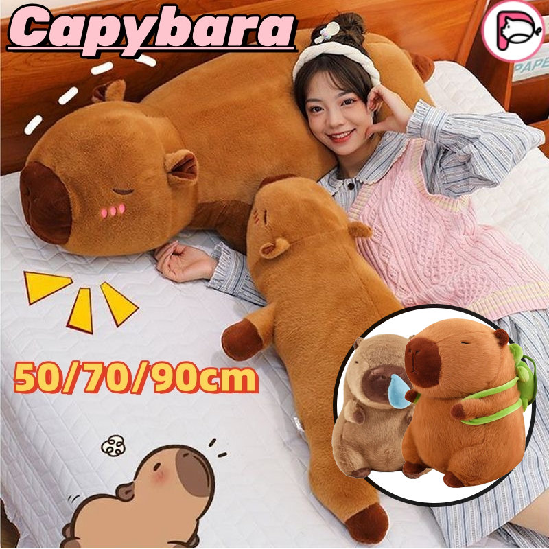พร้อมส่ง🔥Capybara50/70/90เซนติเมตร คาปิบาระ ของเล่นตุ๊กตา การ์ตูนสร้างสรรค์ยัดไส้นอนหมอนยาวตกแต่งบ้านของขวัญวันวาเลนไทน์