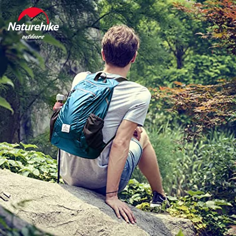 Naturehike 18 L เป้เดินป่าเป้สะพายหลังอัลตราไลท์พับเก็บได้กระเป๋าเดินทางท่องเ ที่ยวกลางแจ้งกระเป๋าเป้ตั้งแคมป์กลางแจ้ง