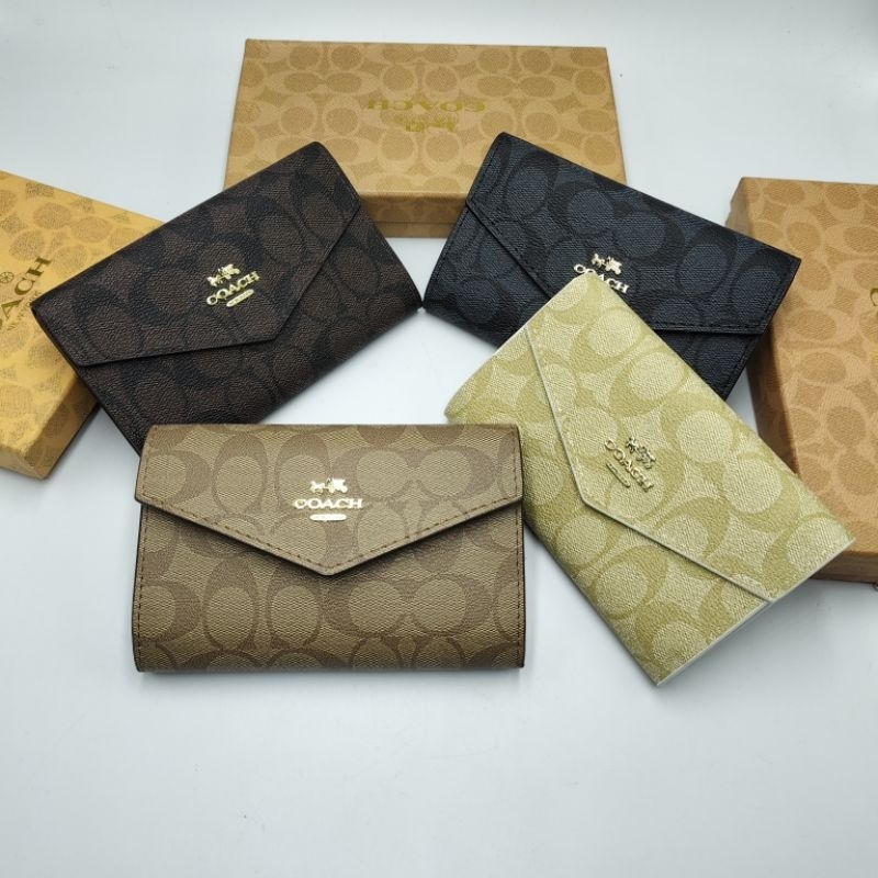 กระเป๋าสตางค์ ใบกลางขนาด6นิวมีการ์ดถุงผ้าพร้อมกล่องงานสวยพร้อมส่ง