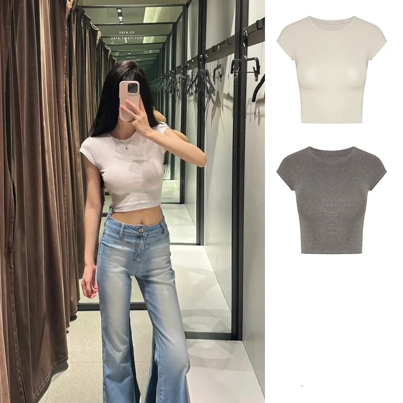 เสื้อยืดผู้หญิงทรงเข้ารูปสไตล์มินิมอล แฟชั่นใหม่ปี 2025 ใส่สบาย แมตช์ง่าย แขนสั้น เอวลอย พรางหุ่น ดูดีทุกโอกาส