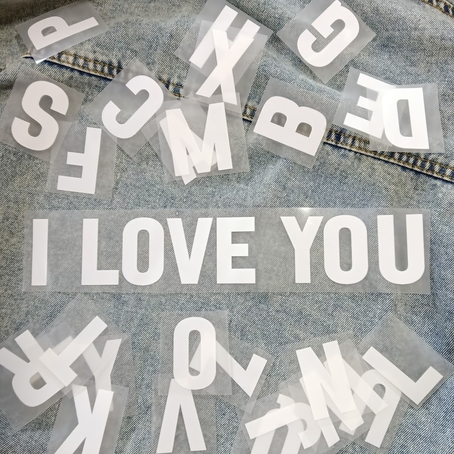 ตัวรีดติดเสื้อ สติกเกอร์ติดเสื้อ อักษร Female 0-9 และ อักษร A-Z สีขาว F.57 ฟอนต์กลมมนเล็ก รีดติดทุกเนื้อผ้า