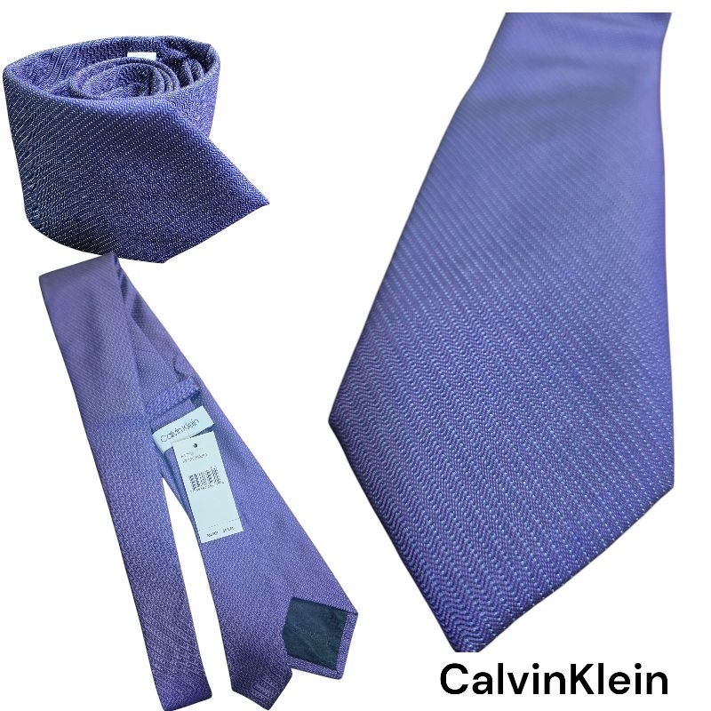 เนคไทชาย calvin Klein 100%สีม่วงเข้มลายทาง  ใหม่ป้ายห้อย