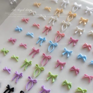 อะไหล่โบว์สวยๆ คละสี นำมาตกแต่งเล็บ ติดของอเนกประสงค์ 50 ชิ้น/ห่อ สินค้าพร้อมส่ง