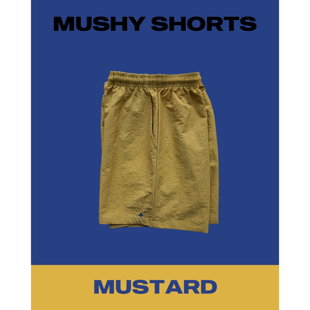 UNUSUAL MUSHROOM MUSHY SHORTS - MUSTARD - กางเกงขาสั้น ผ้าไนลอน UNISEX