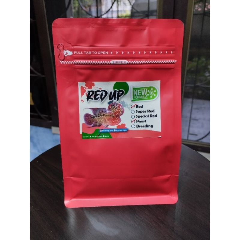 200 กรัม Red Up อาหารสำหรับปลาหมอสี ปลานกแก้ว เม็ดลอย สูตรเร่งแดง เร่งมุก ขนาด 200 กรัม แบบซอง