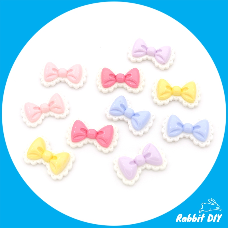 เรซิ่น โบว์ มีหลายสี ระบายขอบสีขาว (แพ็กรวมทุกสี 10 ชิ้น)