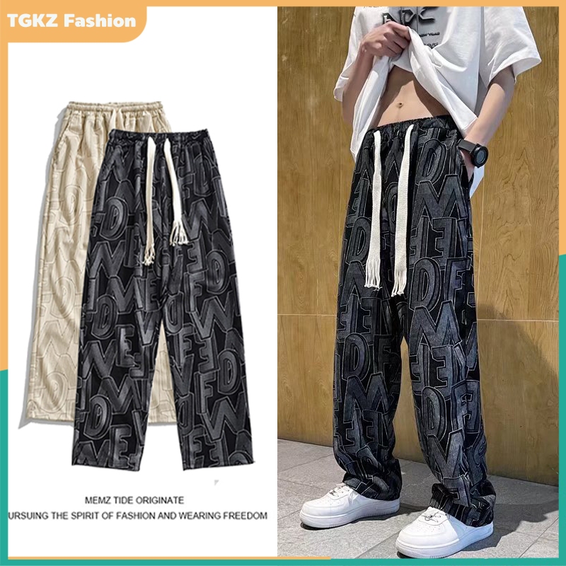 กางเกงลำลองลายจุด High street American สำหรับผู้ชายและผู้หญิง กางเกงวอร์มขากว้างทรงหลวมอเนกประสงค์สไตล์ฮ่องกง