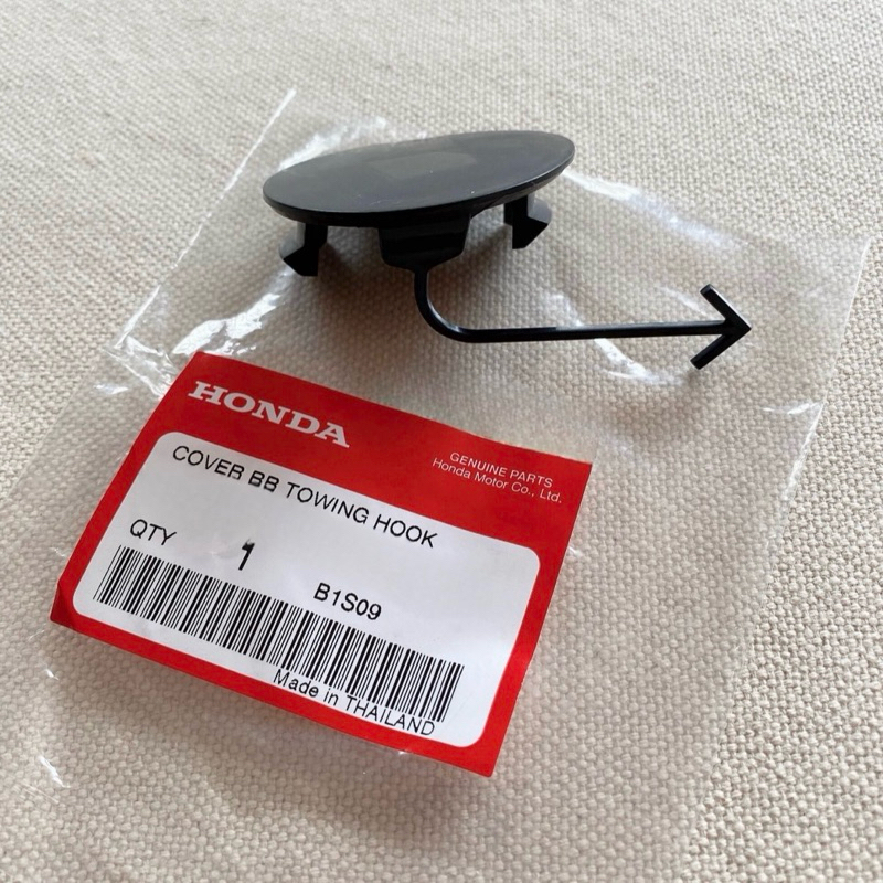 อะไหล่แท้ศูนย์ ฝาปิดรูลากรถ แผ่นปิดรูกันชนหลัง JAZZ GE 2008-2011 (OM-71504-TF0-000ZN)