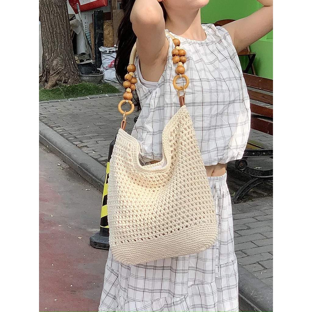 B182）กระเป๋าสานลูกปัด ของใหม่  กระเป๋าสะพายไหล่สตรี  สไตล์ไม่ซ้ำใครเหมาะแก่การถ่ายรูปมาก(จัดส่งจากกรุงเทพ)