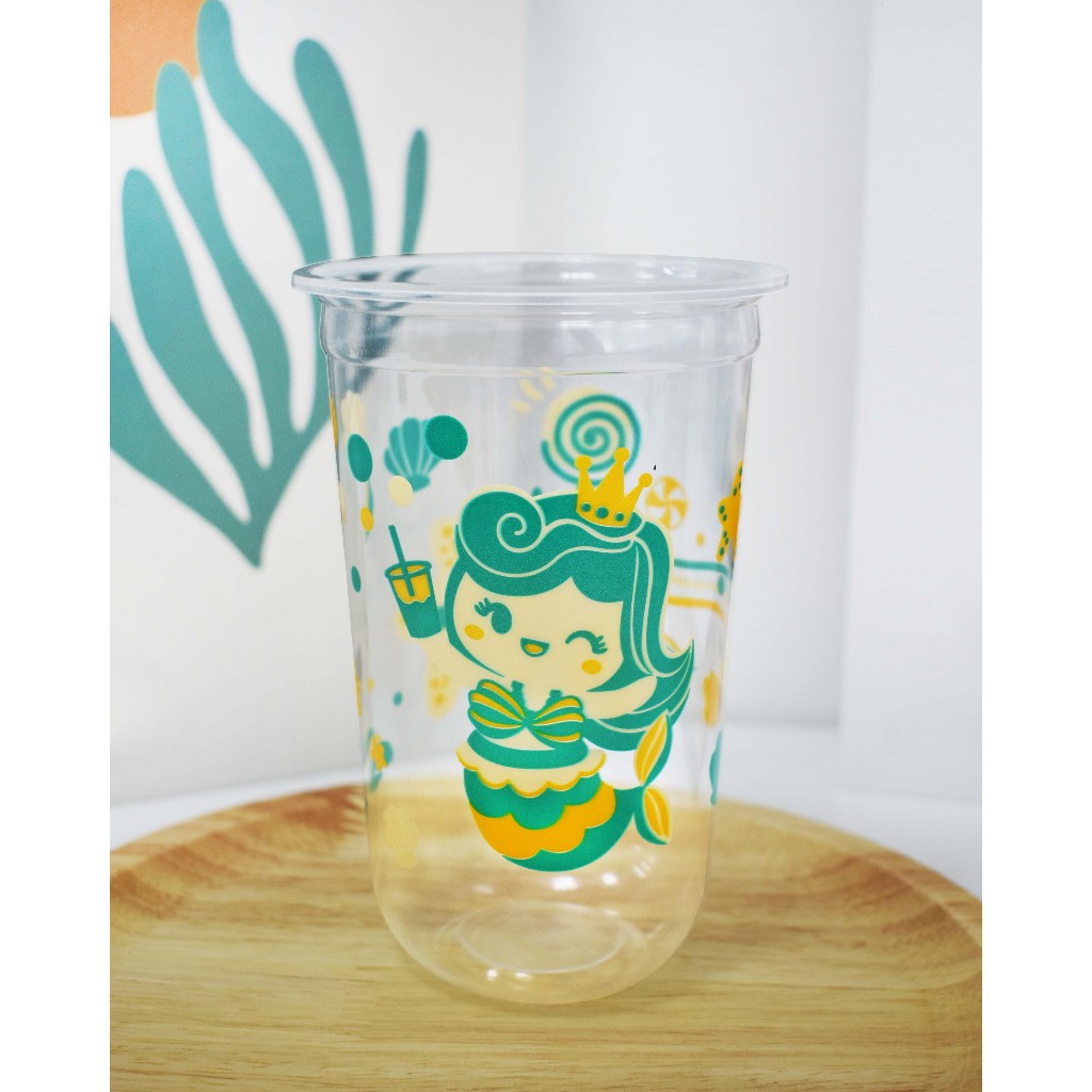 แก้วพิมพ์ลายทรงแคปซูล ตราโฮมคัพ ฝาปิด95 ขนาด22ออนซ์ ยกลัง1000ใบ(50ใบ x 20แถว) **HC-Q22เมอเมดเขียว**