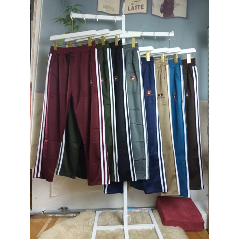 95# กางเกงวอร์มผ้ามันแต่งแถบขาเนื้อผ้านิ่มยืดใส่สบายกระเป๋า 2 เชือกผูกเอว