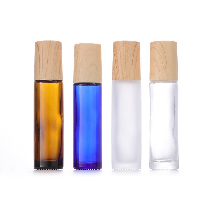 (แพ็ค 10 ชิ้น) ขวดแก้วหนา หัวลูกกลิ้งเหล็ก ฝาลายไม้ ขนาด 5-10 ml. #P436 ขวดใส่น้ำมัน น้ำหอม รีฟิล พกพา PackingDD