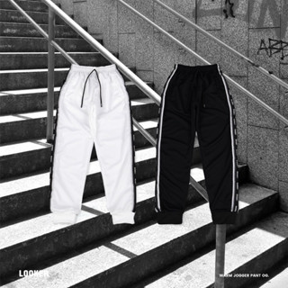 LOOKER - กางเกงวอร์มขาจั๊มแถบโลโก้