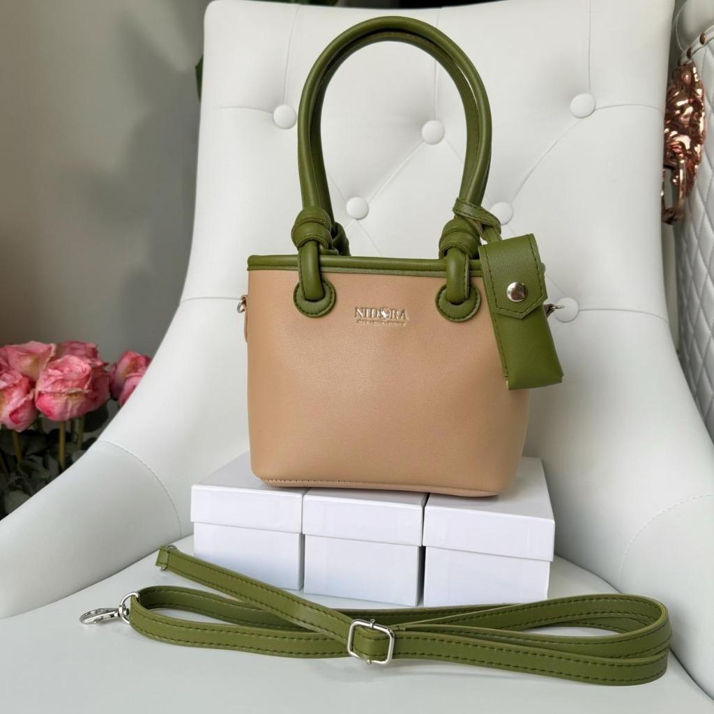 45 กระเป๋าNIDORAงานแท้ รุ่นหูผูกยอดฮิตได้ไปพร้อมกระใส่ลิปงานน่ารักมาก หนา 4 นิ้ว กว้าง 9 นิ้ว สูง 6 