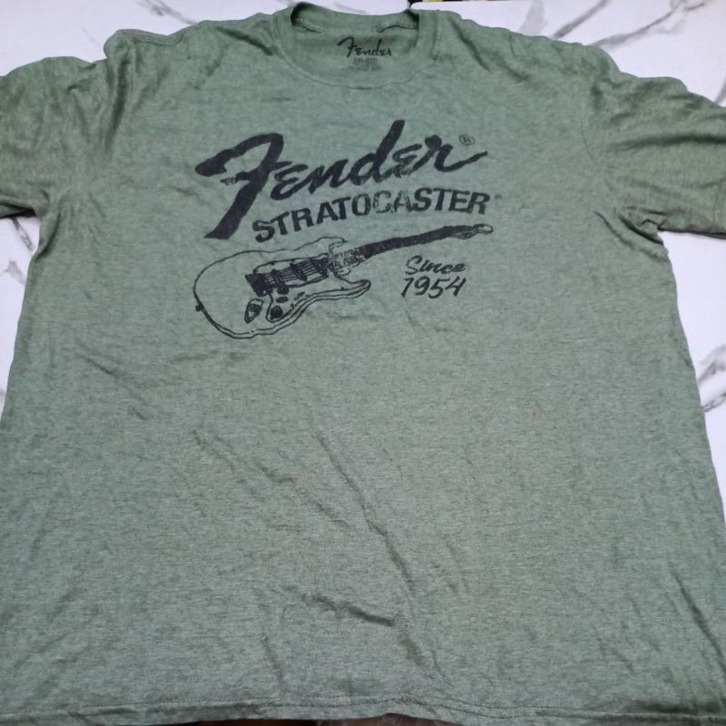 เสื้อยืดลายกีต้าร์ fender สวยๆสกรีนชัด size XLอก 22 ยาว 29 ไม่มีตำหนิไม่มีรูคอไม่ย้วยมีส่วนลดและมีปล