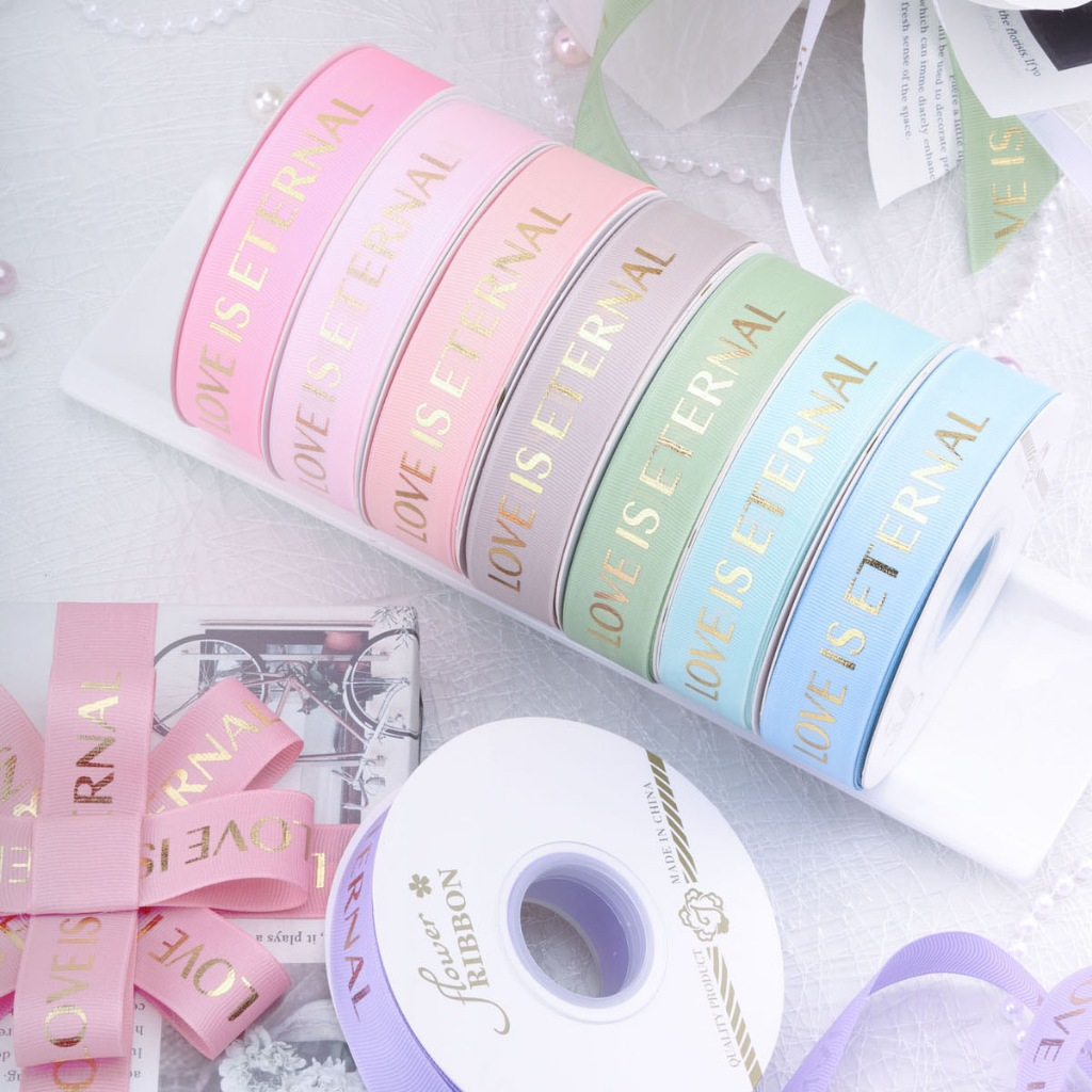ริบบิ้นผ้าไหม ปั๊มเงาเล่นแสง ขนาด 2.5 CM./ยาว 36 เมตร  สีสวยชัด พร้อมส่ง!!