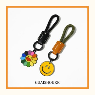 murakami flower พวงกุญแจหนังวัวจี้โลหะดอกไม้ดวงอาทิตย์หน้ายิ…