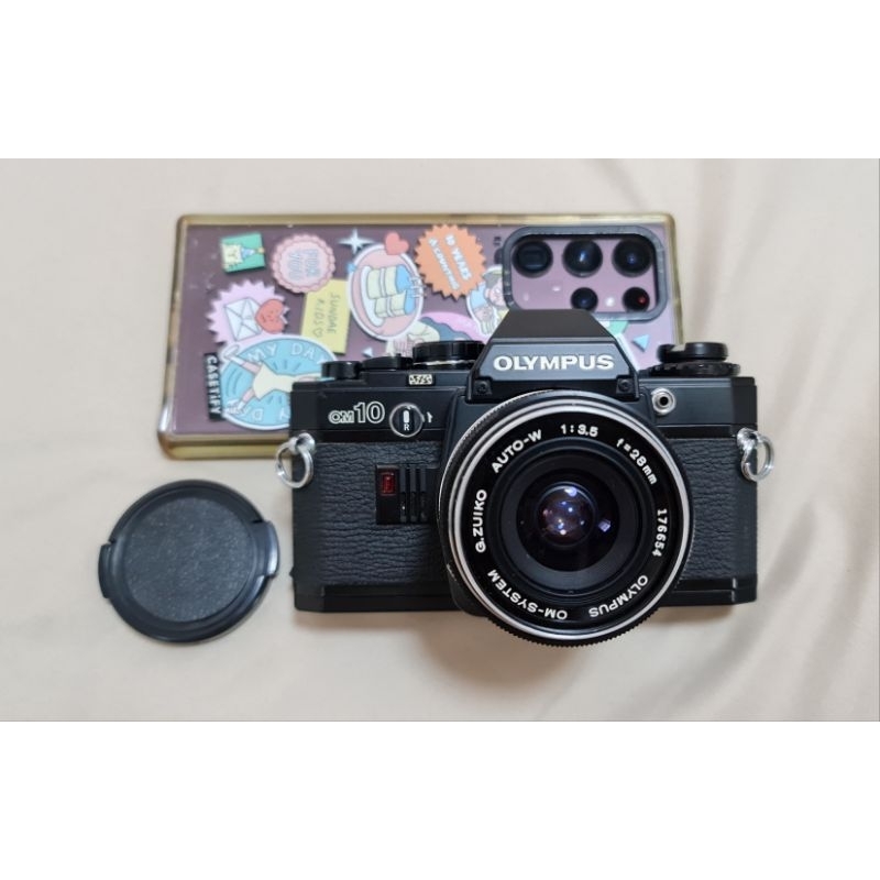 กล้องฟิล์ม OLYMPUS OM-10 Black+ เลนส์ 28 mm.