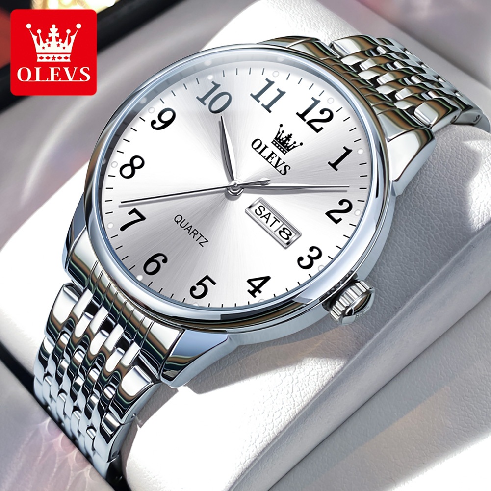 OLEVS นาฬิกาผู้ชาย กันน้ำ100% แท้ ธุรกิจ ปฏิทิน ดูวันที่ เรืองแสง สายสเตนเลส นาฬิกาข้อมือควอตซ์ 5535