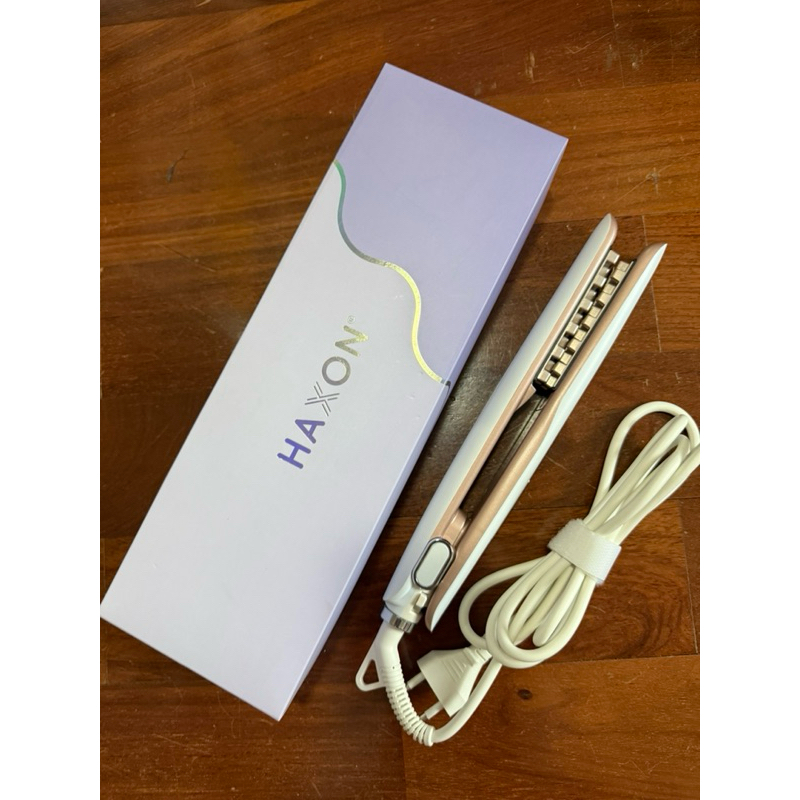 เครื่องหนีบยกโคนผมของ Haxon มือ2